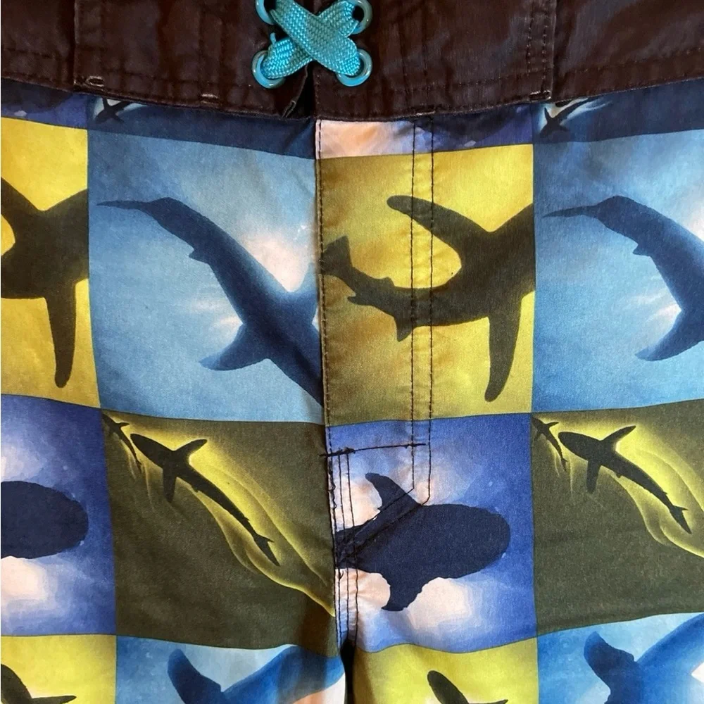 Husky boys swim trunks size M (10/12)